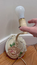 Load and play video in Gallery viewer, 1940s Porcelain Wall Sconce, Rose Floral Boudoir Lamp, Rope Tassel Ceramic Plug-In Light
